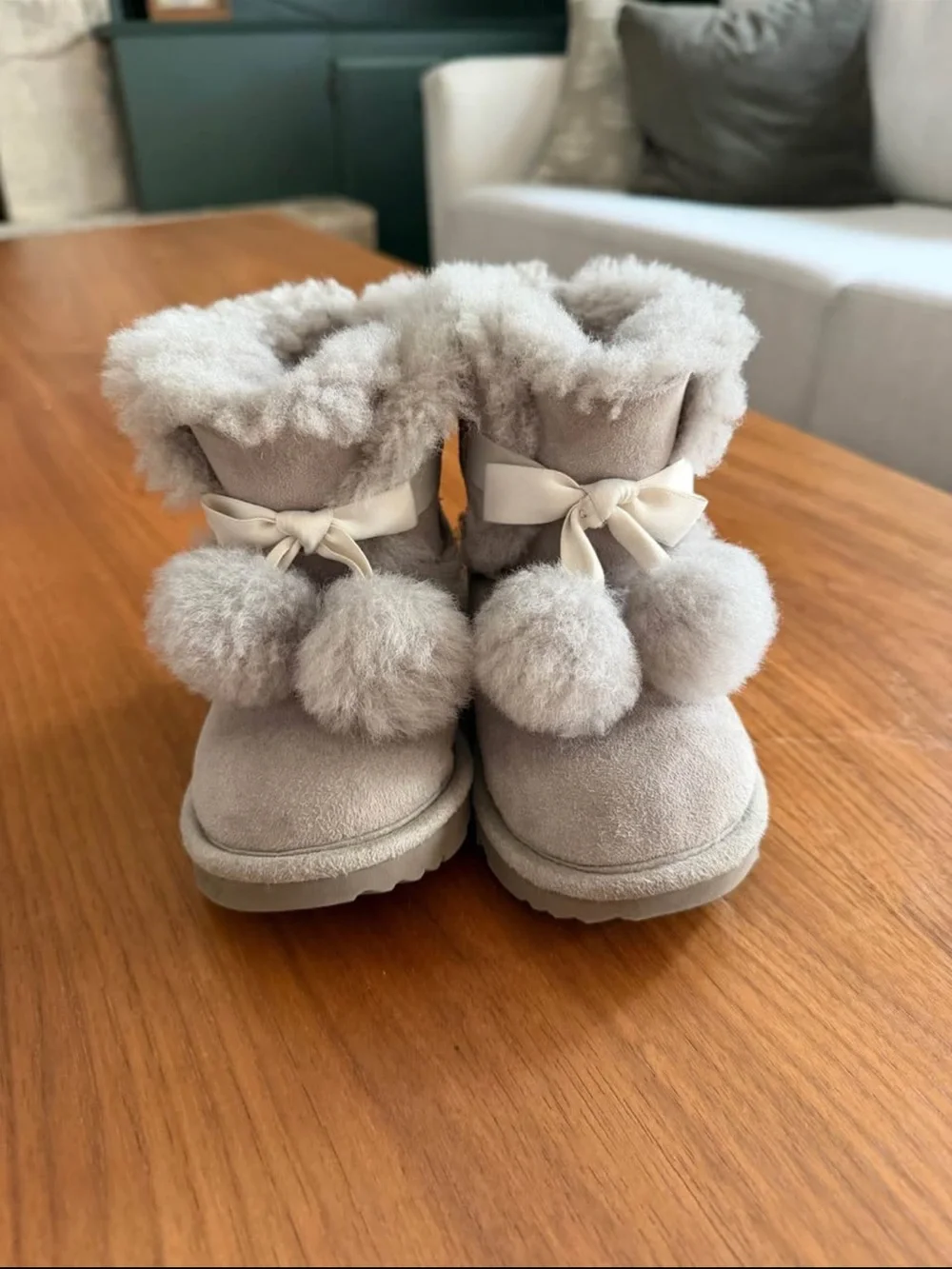 UGG Kids Pom-Pom Shearling Boots in Light Beige